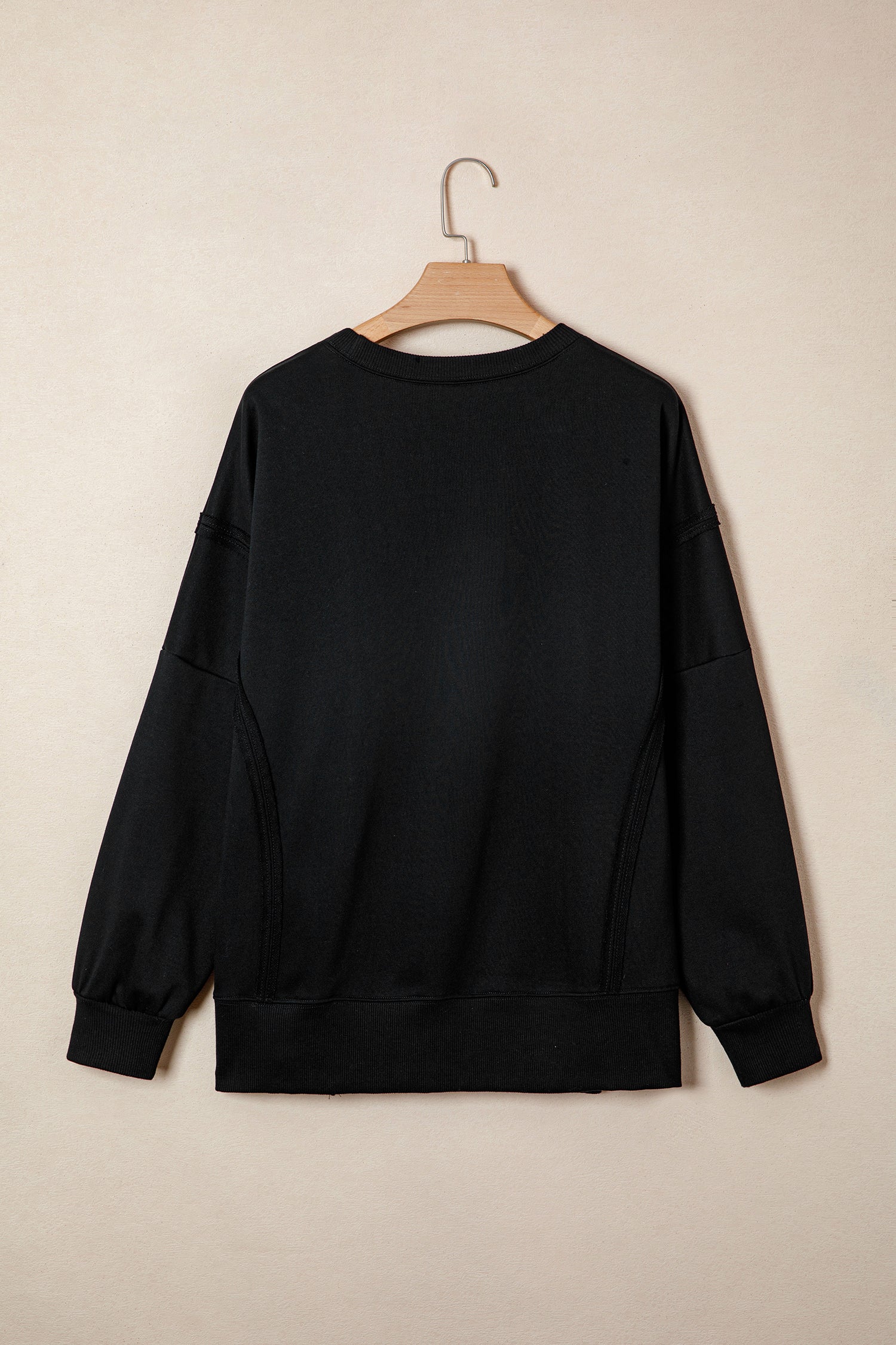 Black Bow Sequin XOXO Letter Graphic Exposed Seam Baggy Sweatshirt